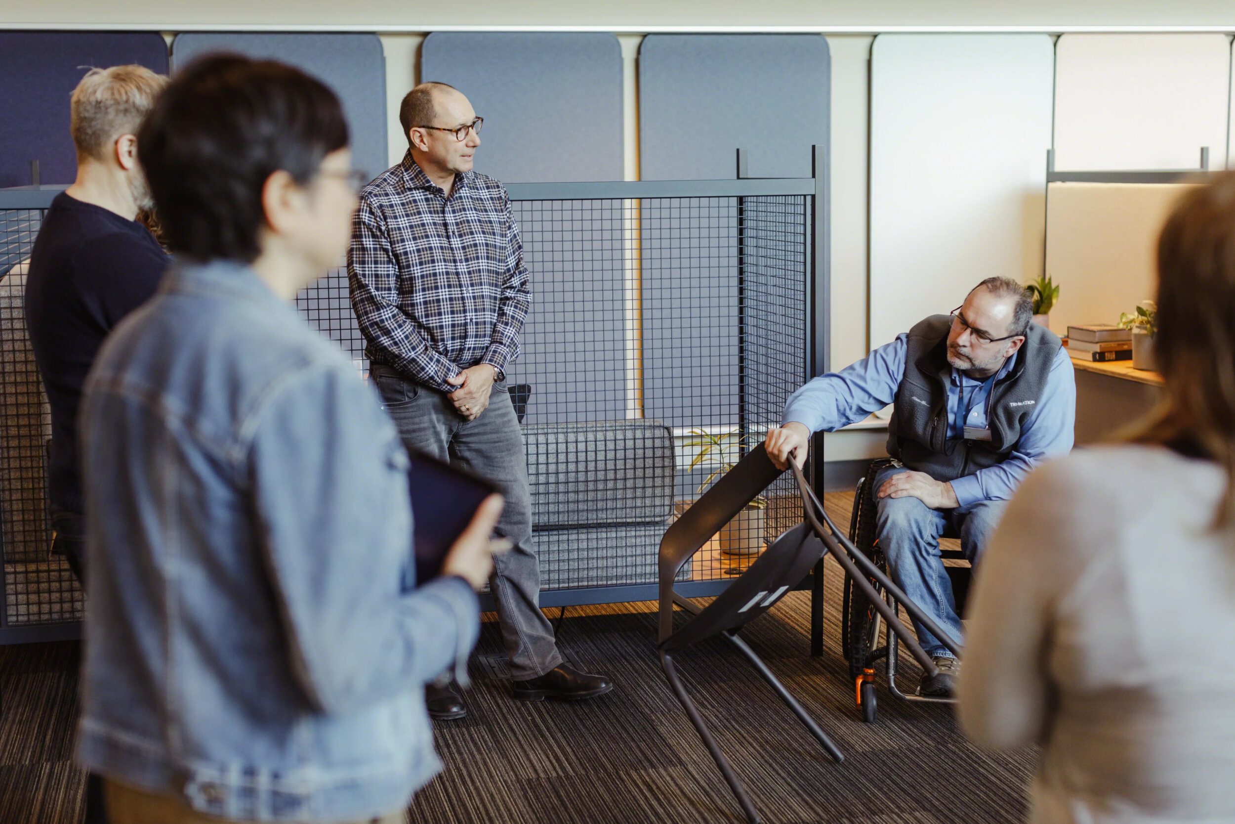 Colleagues gathering in accessible space
